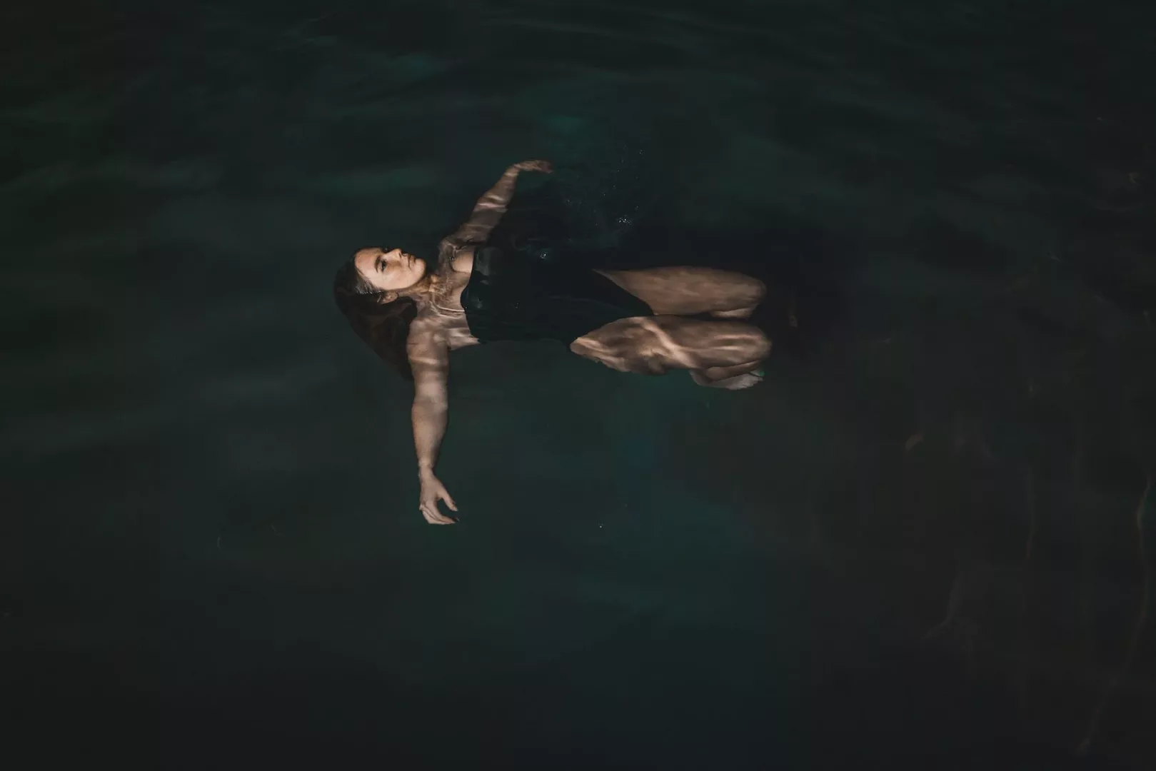 woman floating on water