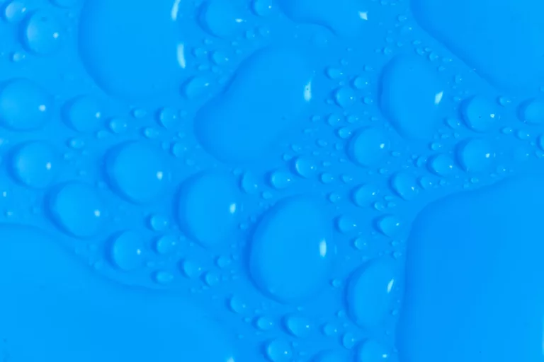 dark blue background with liquid drops
