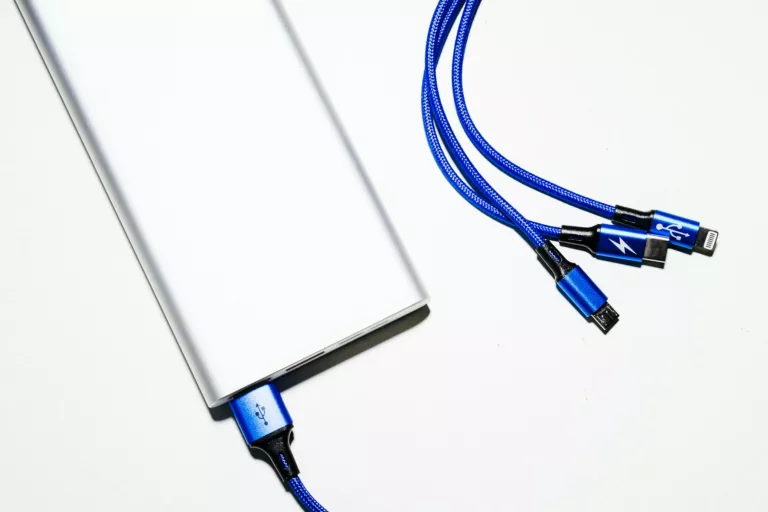 white power bank and blue coated wires