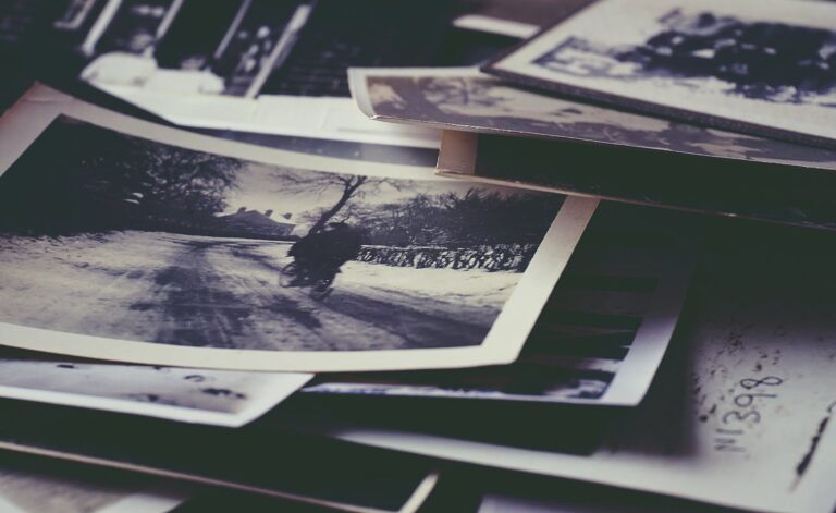 A nostalgic collection of vintage black and white photographs depicting memories and history.