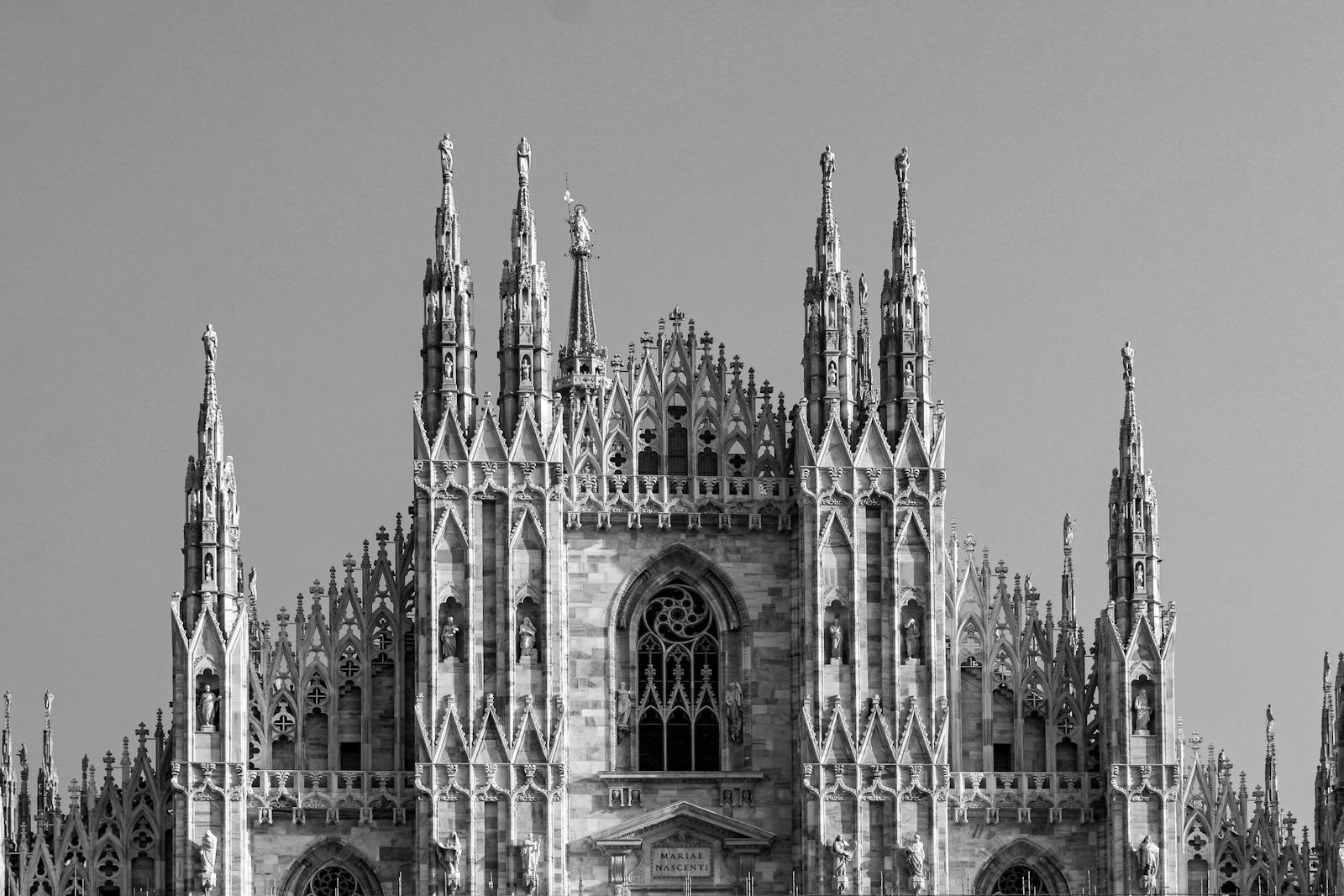 Majestic facade of Milan Cathedral showcasing Gothic architecture.